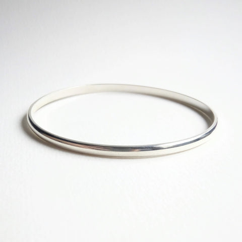 Sterling silver plain bangle made with 3mm x 1.5mm bangle wire. Available in S,M, L - other sizes on request.
