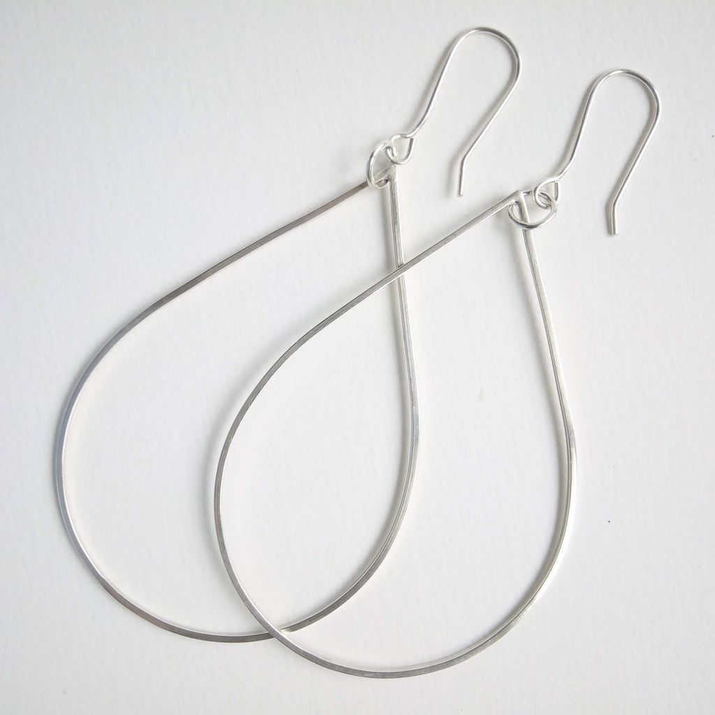 Teardrops are 7cm in length. Earrings hang around 9cm from the ear.