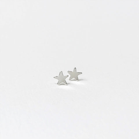 Tiny stars on sterling silver studs. Gold filled means sterling silver coated in a thick coating of gold.