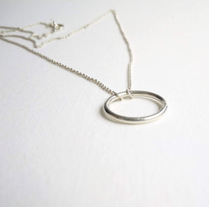 Lovely delicate 15mm circle, hangs on a fine sterling silver chain